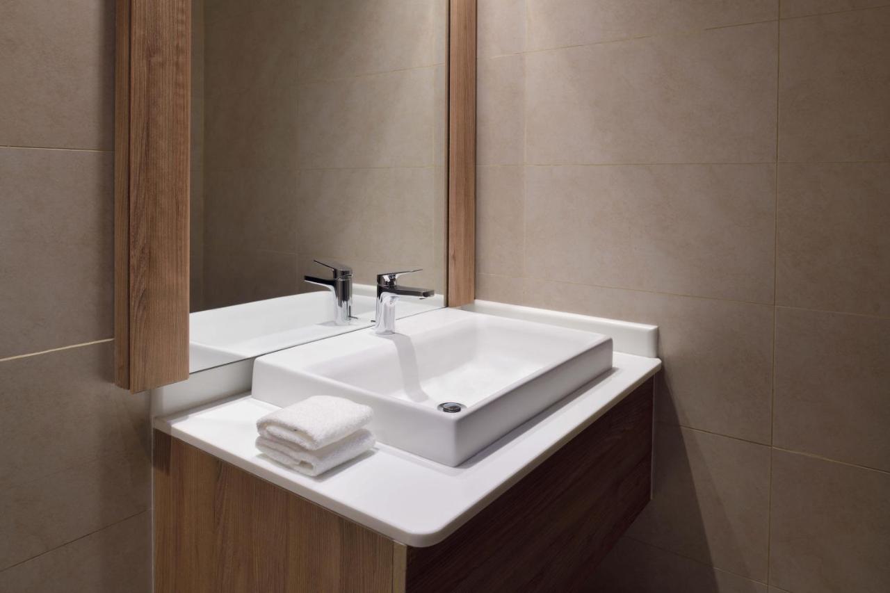 Element By Westin City Center Doha Extérieur photo A washbasin